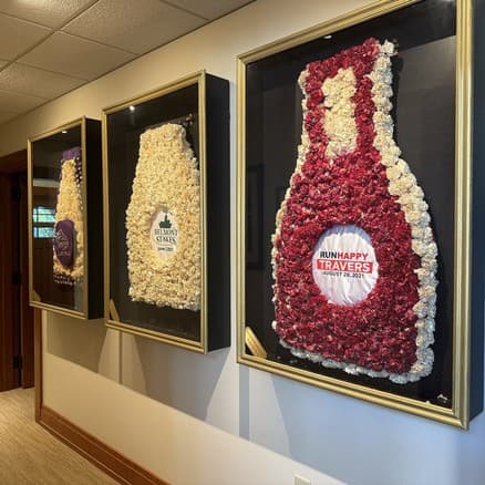 Preserved winning garlands under glass at Darley